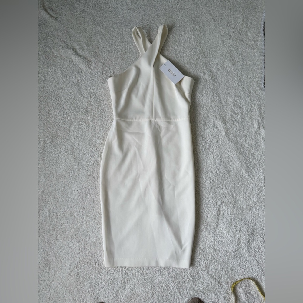 NWT Likely brand size 6 ( runs small) in cream color